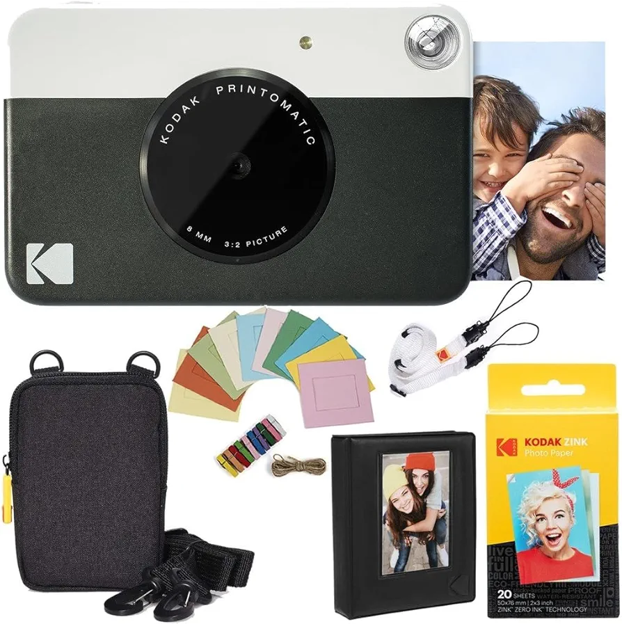 KODAK: Paquete cámara instantánea Printomatic (Negro) + Papel Zink (20 Hojas) + Funda álbum de Fotos + Marcos para Colgar + cómoda