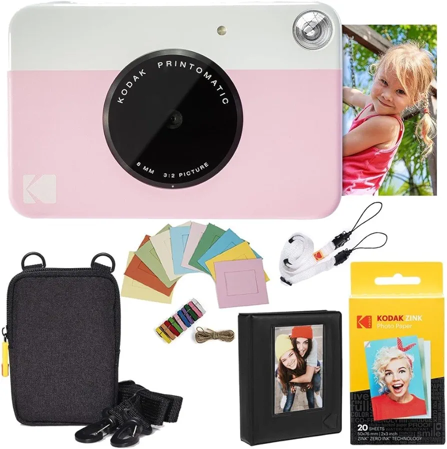 KODAK: Paquete cámara instantánea Printomatic (Rosado) + Papel Zink (20 Hojas) + Funda álbum de Fotos + Marcos para Colgar + cómoda